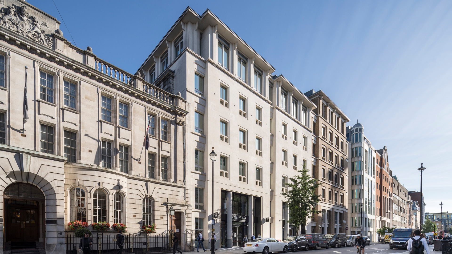 The light stone facade of buildings on Great Marlborough Street in central London on a clear day